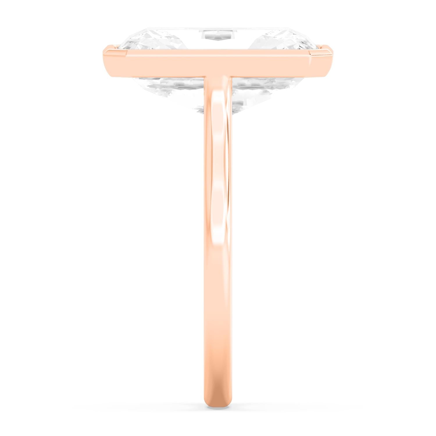 Emerald Bezel Ring - rose gold - side/angle view